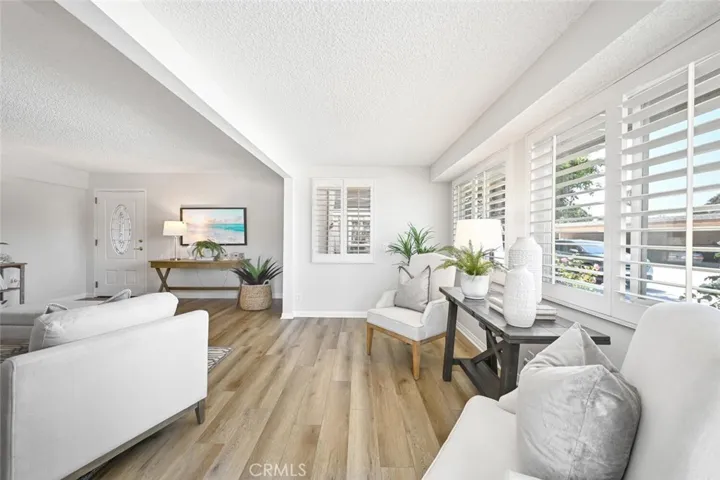Bright white walls and new vinyl floors throughout.