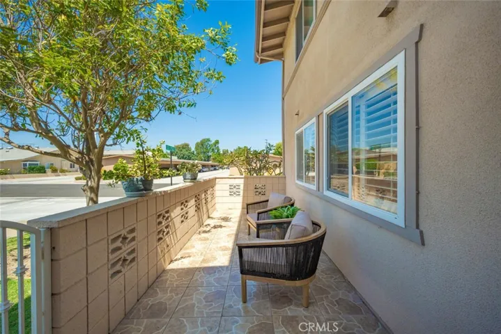 Mature trees and lovely landscape surround this outdoor space.