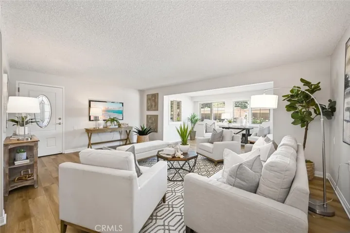 Expanded 2 bedroom corner unit. The living room has been enlarged to incorporate a light filled alcove surrounded by windows.