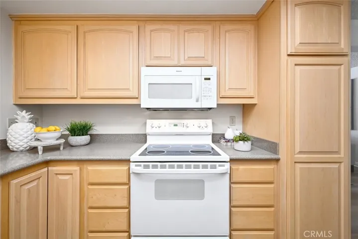 Kitchen remodeled with pantry and lazy Susan corner storage.
