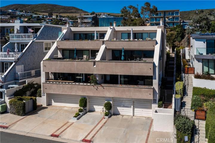 This property comprises three parking spaces: a garage, a carport, and driveway parking spots.