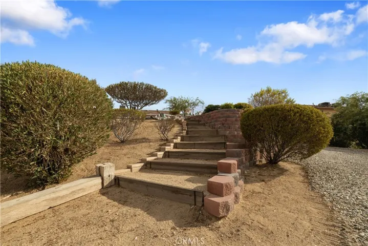 Steps from house to lower lot