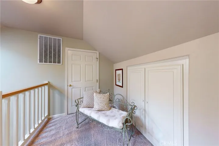 2nd level Landing with storage and access to walk in attic space