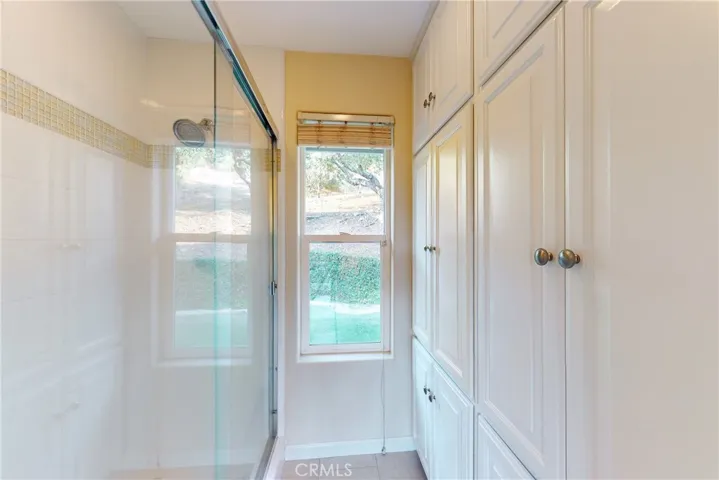 Tons of storage & main downstairs shower!