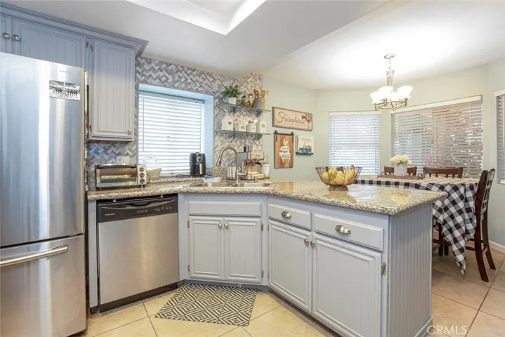 Kitchen with Stainless Steel appliances.