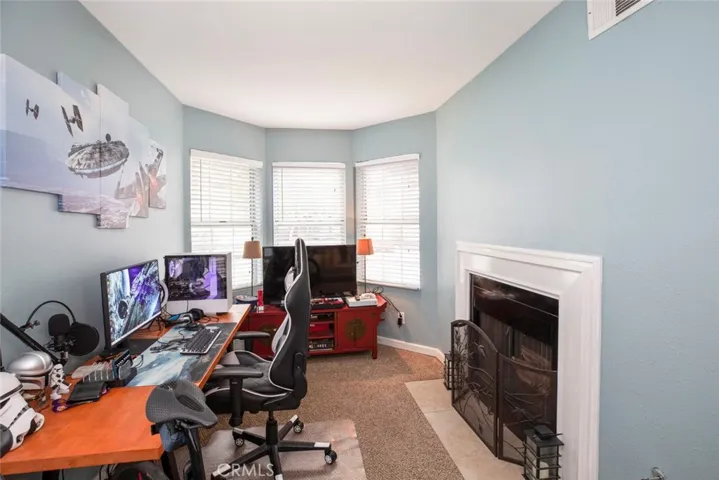 Cozy Den on left side of front door entrance.
