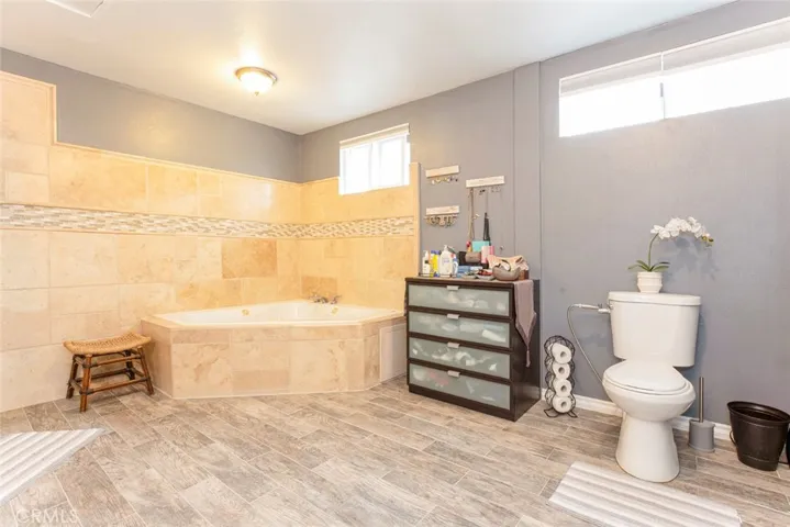 Master Suite Bathroom with Jet​​‌​​​​‌​​‌‌​‌‌​​​‌‌​‌​‌​‌​​​‌​​ Tub.