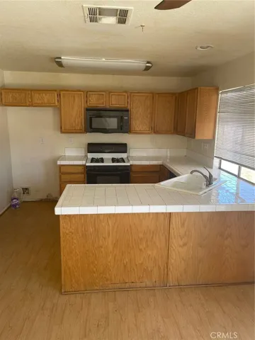 11407 Spring Street, Adelanto, California 92301