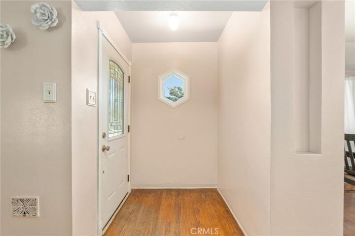 entry way with vintage accented window!