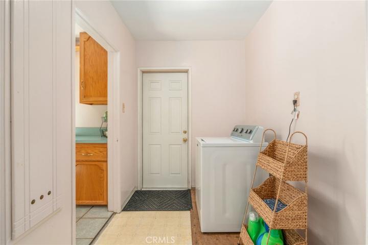 indoor laundry room- door leads to backyard
