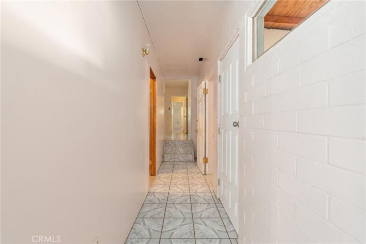 Hallway leading to 2 additional bedrooms!