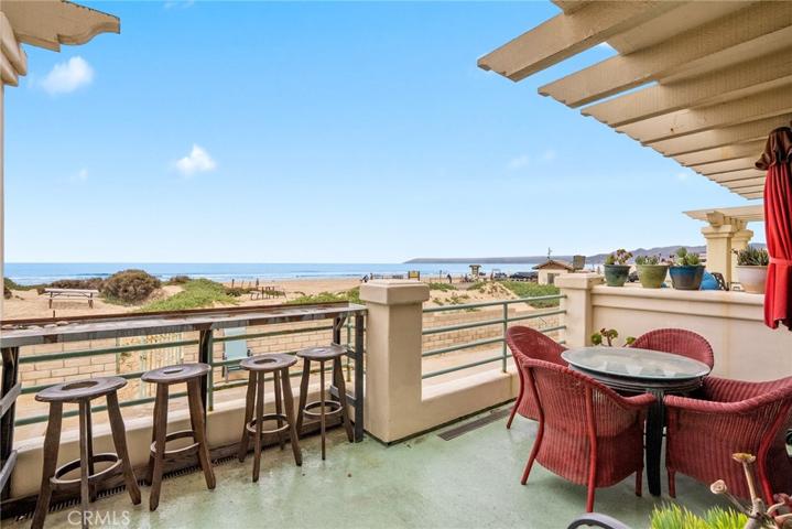 Downstairs patio that leads directly to private  beach