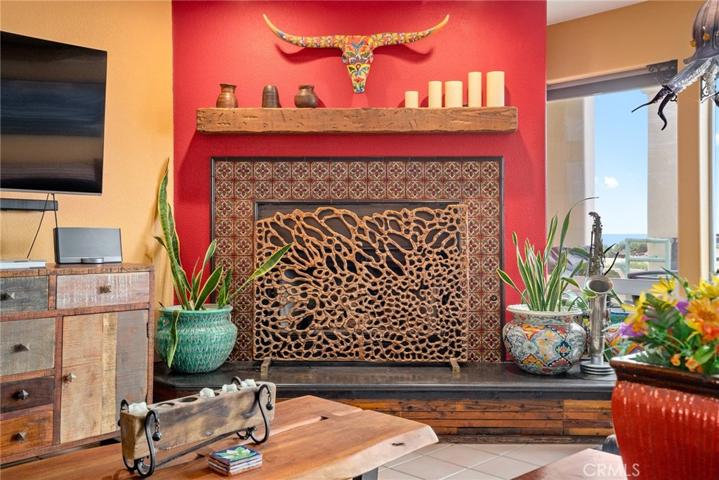 Fireplace with custom handpainted tile surround