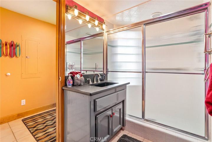 Downstairs bathroom with walk in shower