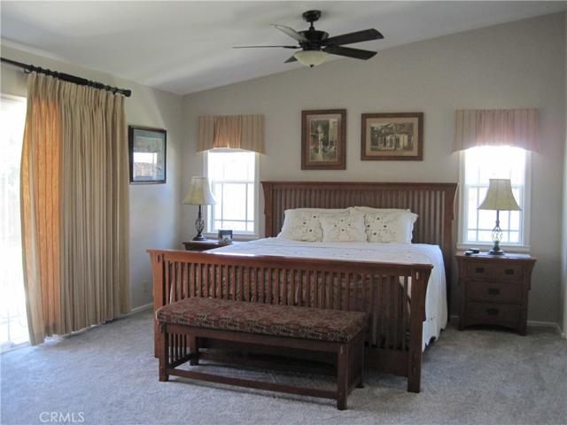 HUGE PRIMARY SUITE-VAULTED CEILING-SLIDER TO BACKYARD!