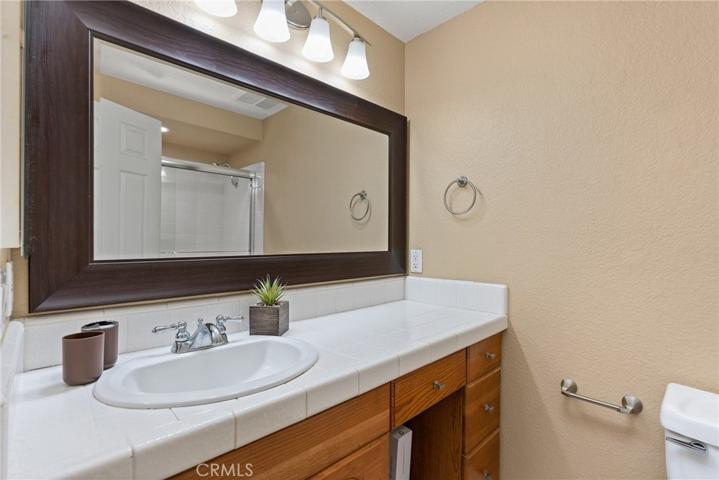 The secondary bedrooms share a nicely appointed full hallway bathroom with a shower/tub!