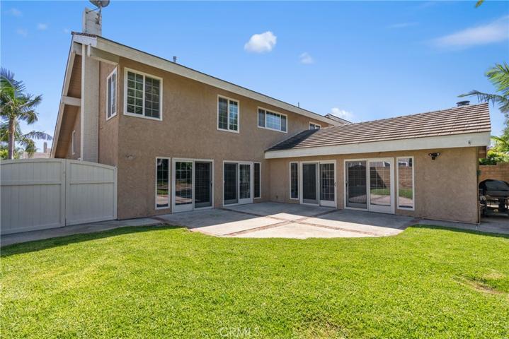 The nicely sized and private backyard has a grass area for pets and kids to play!