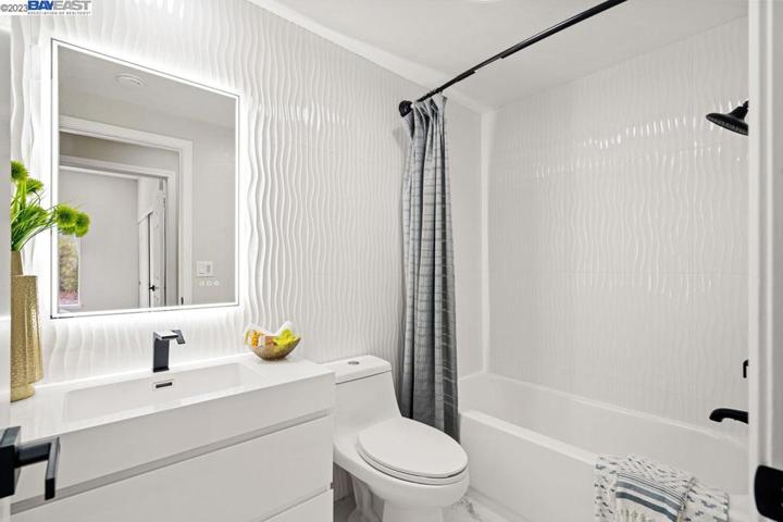 Full bathroom on main floor. Excellent for guests or multi gen.