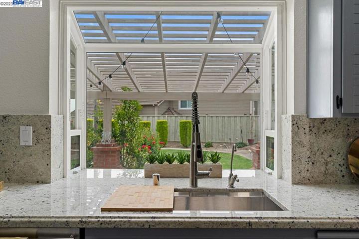 Picture window with views to mountains at a distance and close up to your rose garden.