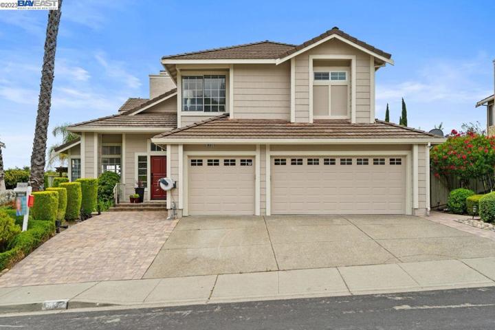 Front view, three car garage