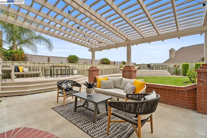 Large pergola with cement flooring. Solar lights.