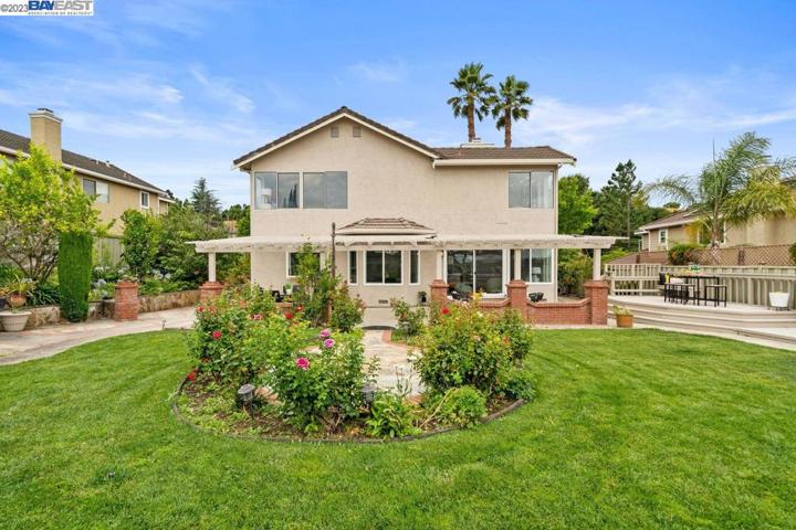 Premium level lot offers 0.23 acres. large deck, rose garden, mature fruit trees, shed.