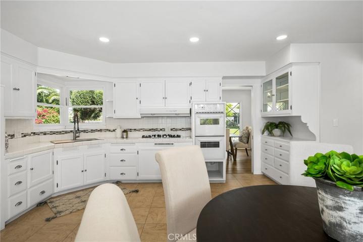 Kitchen connects to dining room