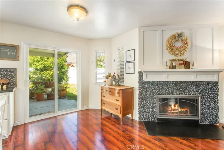 Updated stone fireplace and new sliding glass door