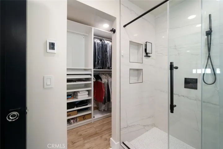 Main home primary bedroom ensuite and walk-in closet
