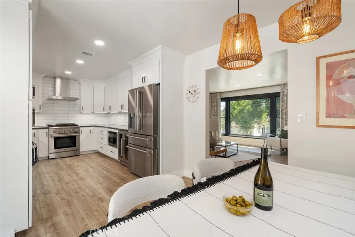 Main home- View from banquette to kitchen