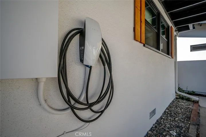 Tesla charger in carport