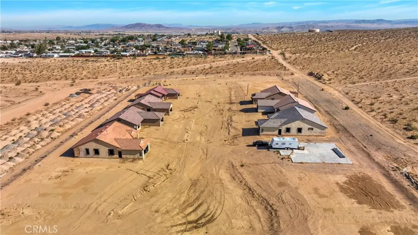 Seven homes and one home pad already built. Eight more spaces on this cul-de-sac. Project is for 100 homes. Shovel ready.