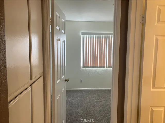 Linen Hall Closet entryway to second bedroom and bathroom.