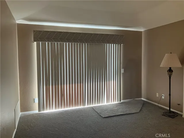 New Blinds on Sliding door window that leads to outside patio.