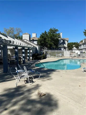 Community pool, picnic table, lounging chairs, bathrooms, etc.
