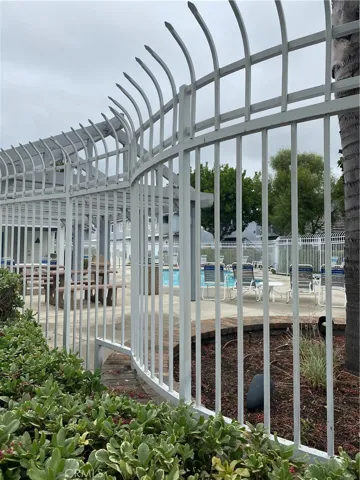 Enclosed pool area with bathrooms.