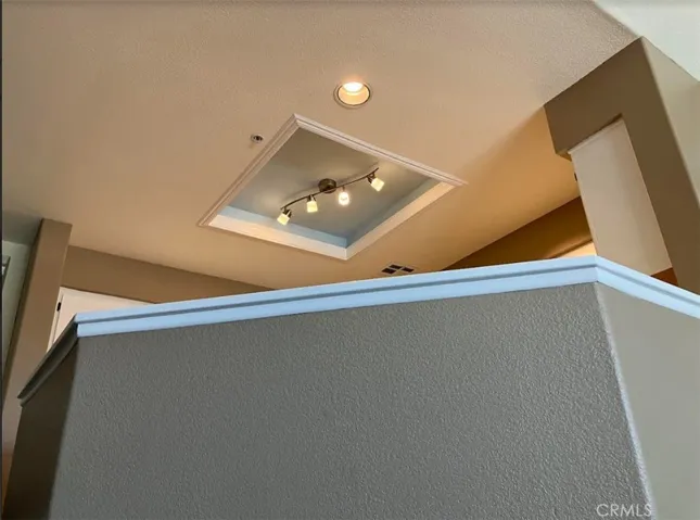 Kitchen Sculptured lighting area with track lighting, fresh paint throughout kitchen areas.