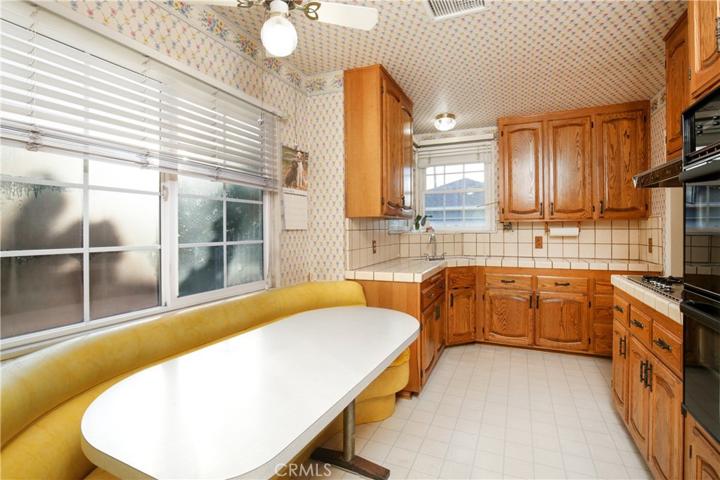 Sunny kitchen with breakfast booth