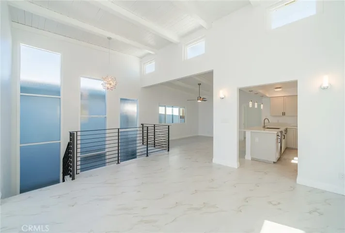 Up the stairs to the 2nd level with lots of natural light