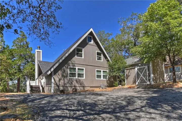 Front with level circular driveway