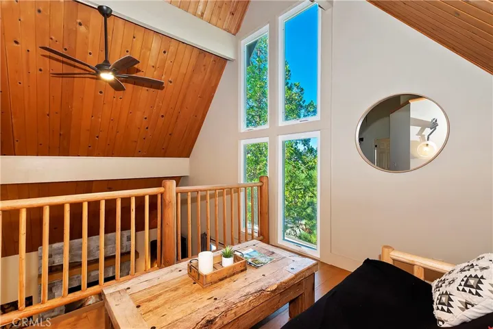 a loft area for guests or a office/reading room