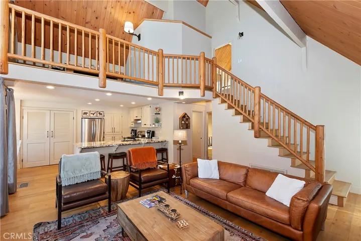 Stairs lead to en suite bedroom