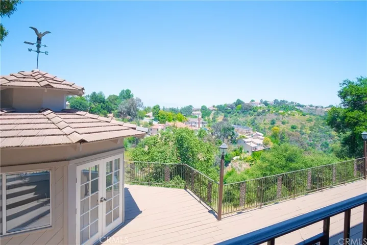 Deck over canyon with view of enclosed gazebo