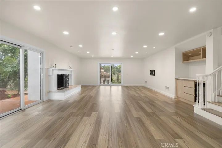 Family Room with access to back yard and balcony overlooking the canyon