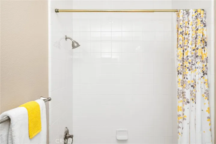 Bathroom attached to bedroom on first level