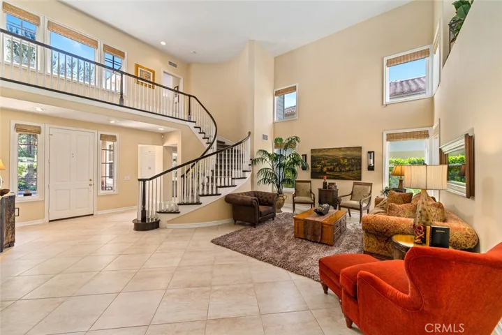 Formal living room with high ceilings