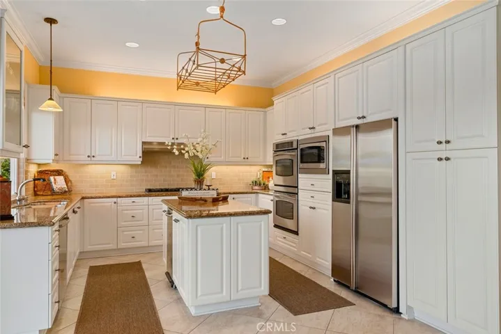 Kitchen with island, stainless steel appliances