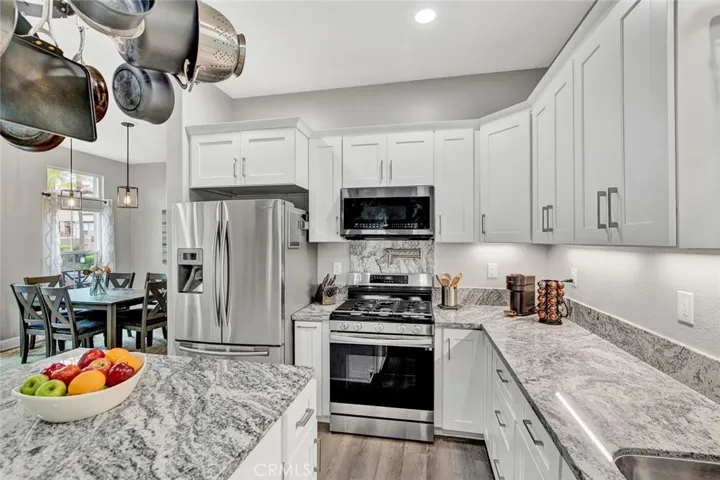 Remodeled Kitchen With With Stainless Steel Appliances & Pot Filler