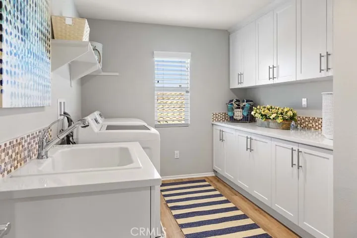 Photo of Model Home Laundry room shown.
