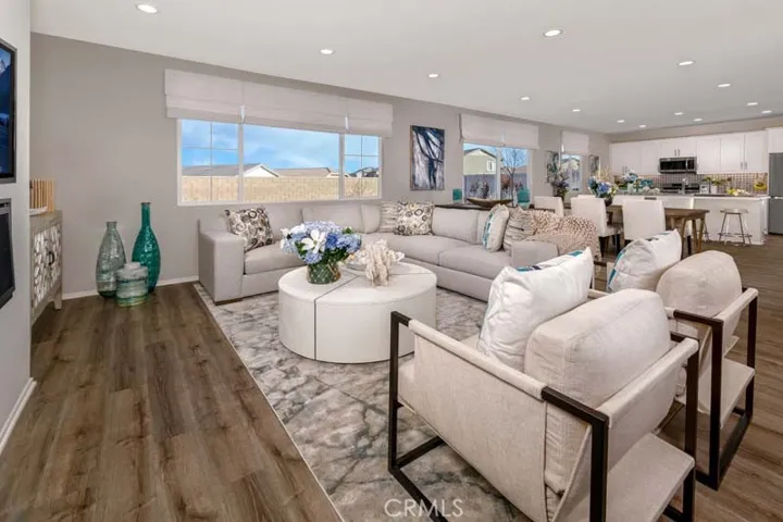 Photo shown of Model Home Great Room area.